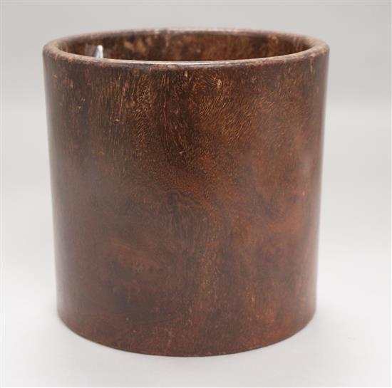 A Chinese hardwood brushpot, with pierced circular hole to the base, height 17.5cm